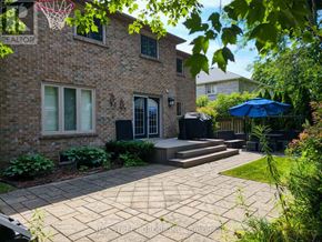 Oakville (Fd Ford) apartment for rent - A brick house with a patio and a basketball hoop.