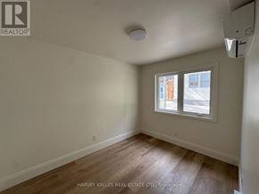Toronto (Corso Italia-Davenport) apartment for rent - A room with a window showing an outdoor view.