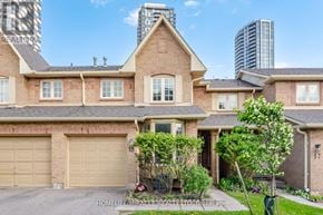 Mississauga (Hurontario) townhouse for rent - A large house with a garage is for sale.