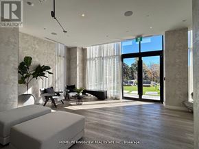 Mississauga (Cooksville) condo for rent - A living room with a couch, chairs, and a large window.