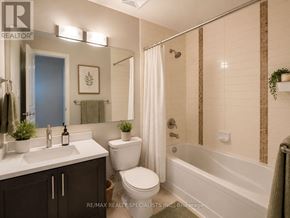 Mississauga (Fairview) condo for rent - A bathroom with a toilet, sink, and bathtub.