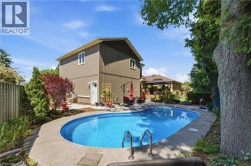 Ancaster apartment for rent - A house with a pool in the backyard.