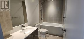 Mississauga (City Centre) condo for rent - A bathroom with a sink, toilet, and bathtub.