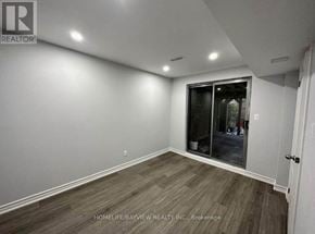 Newmarket (Summerhill Estates) townhouse for rent - A room with a sliding glass door leading to a balcony.