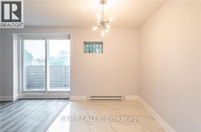 Port Colborne (Main Street) apartment for rent - A room with EXP REALTY, Brokerage logo on the wall.