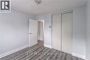 Port Colborne (Main Street) apartment for rent - A room with a sliding door and a ceiling fan.