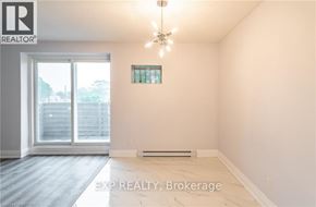 Port Colborne (Main Street) apartment for rent - A room with EXP REALTY, Brokerage logo on the wall.