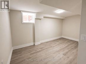 Oshawa (Taunton) apartment for rent - A room with light wood flooring and white walls.