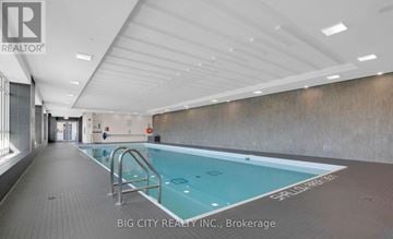 Toronto (Henry Farm) condo for rent - A large indoor swimming pool with a diving board.