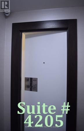 Mississauga (City Centre) condo for rent - A door with a sign that says Suite # 4205.