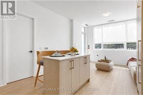 King (King City) condo for rent - A white interior with a wooden table and chairs.