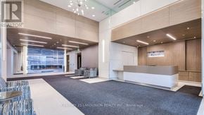 Markham (Unionville) condo for rent - A reception area with a desk and chairs.