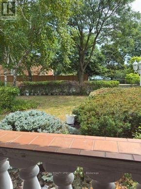 Brampton (Northgate) apartment for rent - A garden with a fence and a tree in the middle.
