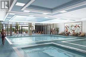 Vaughan (Beverley Glen) condo for rent - A large indoor swimming pool with people around it.