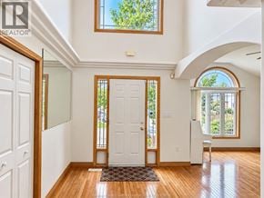 Windsor apartment for rent - A large white door is in the middle of a hallway.