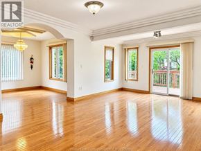 Windsor apartment for rent - A large empty room with wooden floors and white walls.