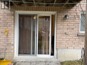 Newmarket (Woodland Hill) apartment for rent - A realtor is showing a home to a potential buyer.