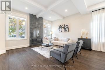 Burlington (Roseland) apartment for rent - A living room with a grey sofa and a black coffee table.