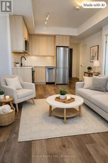 Milton (Tm Timberlea) condo for rent - A modern living room with a coffee table in the center.