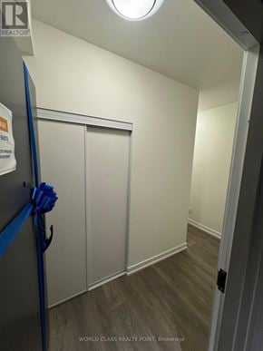 Oakville (Jm Joshua Meadows) condo for rent - A room with a sign that says "World Class Reality Point Brokerage".