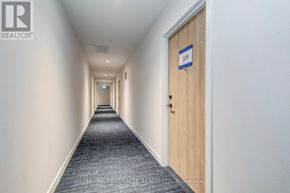 Toronto (Stonegate-Queensway) condo for rent - A hallway with a door numbered 109.