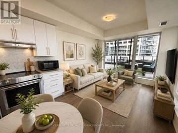 Vaughan (Concord) condo for rent - A modern kitchen with a dining table and chairs.