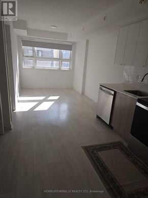 Burlington (Lasalle) townhouse for rent - A kitchen with a sink and a window.