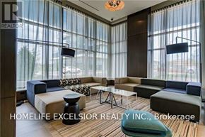 Mississauga (Central Erin Mills) condo for rent - A living room with a couch, ottoman, and a coffee table.