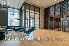 Mississauga (Central Erin Mills) condo for rent - A spacious office room with a glass partition wall and a wooden floor.