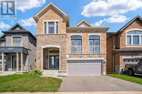 New Tecumseth (Alliston) apartment for rent - A large brick house with a garage is for sale.