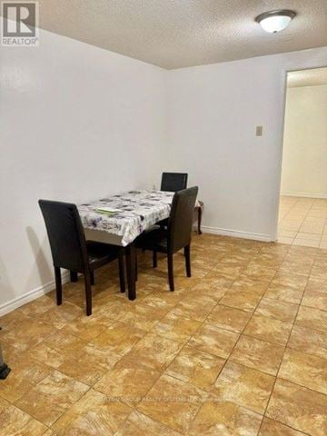 Mississauga (Hurontario) apartment for rent - A dining room with a table and chairs.