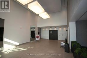 Oakville (Go Glenorchy) condo for rent - A sign in a room that says Rockhaven Realty Inc Brokerage.