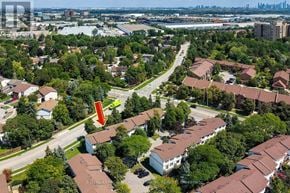 Mississauga (Meadowvale) townhouse for rent - An aerial view of a residential area with a road and houses.