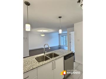 Gatineau (Aylmer) apartment for rent - A kitchen with a granite countertop and a stainless steel sink.
