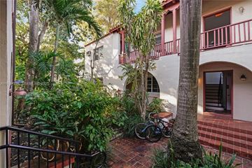 Miami Beach apartment for rent - A bicycle is parked on a brick walkway.