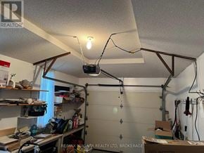 Niagara Falls (West Wood) apartment for rent - A garage with a lot of tools and equipment.