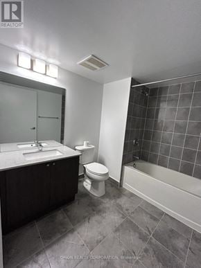 Pickering (Bay Ridges) condo for rent - A bathroom with a sink, toilet, and bathtub.