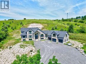 Cramahe apartment for rent - A large house with a driveway in front of it.