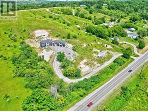 Cramahe apartment for rent - A real estate agent's drone shot of a property with a house and a driveway.