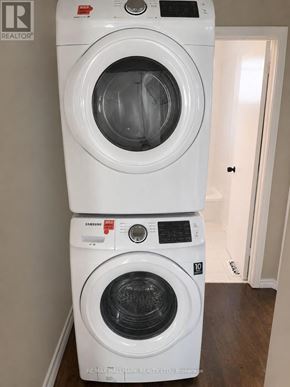 Ajax (South East) apartment for rent - A stack of two white front loading washing machines.