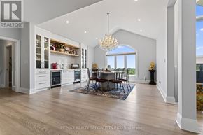 Cramahe apartment for rent - A well-lit, spacious kitchen with a dining table set for four.