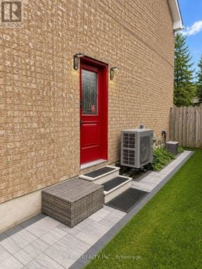 Georgina (Keswick North) apartment for rent - A red door is on a brick house.