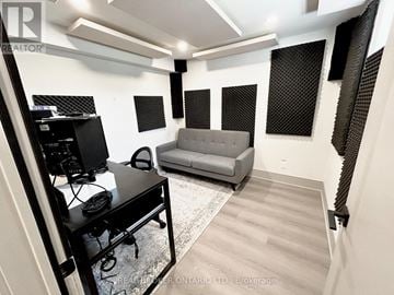 Toronto (Parkwoods-Donalda) apartment for rent - A room with a desk, a couch, and a TV.
