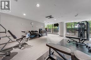 Vancouver apartment for rent - A gym with a variety of equipment including treadmills, weights, and exercise machines.