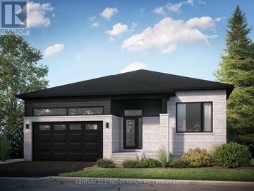 Russell apartment for rent - A modern house with a black garage door is for sale.