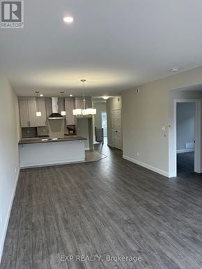 The Nation apartment for rent - A real estate listing photo of a kitchen and living room.