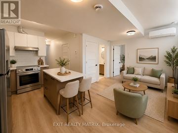 Russell apartment for rent - A well-lit kitchen with a dining table and chairs.
