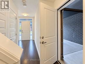 London South (South W) townhouse for rent - A hallway with white doors and a wooden floor.
