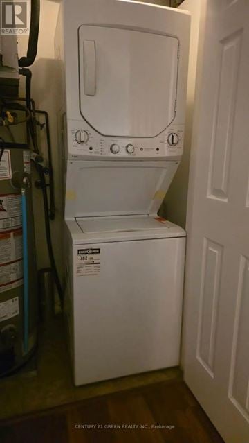 Milton (De Dempsey) condo for rent - A white dishwasher is in a kitchen.