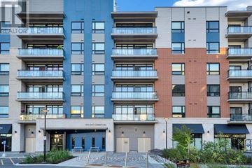 Ottawa condo for rent - A multi-story apartment building with a Re/Max Realty Services Inc. sign in front.